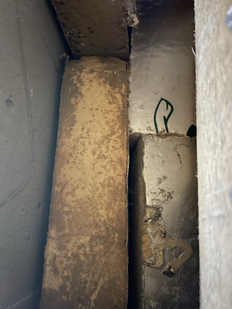 Rigid insulation boards in a wall cavity