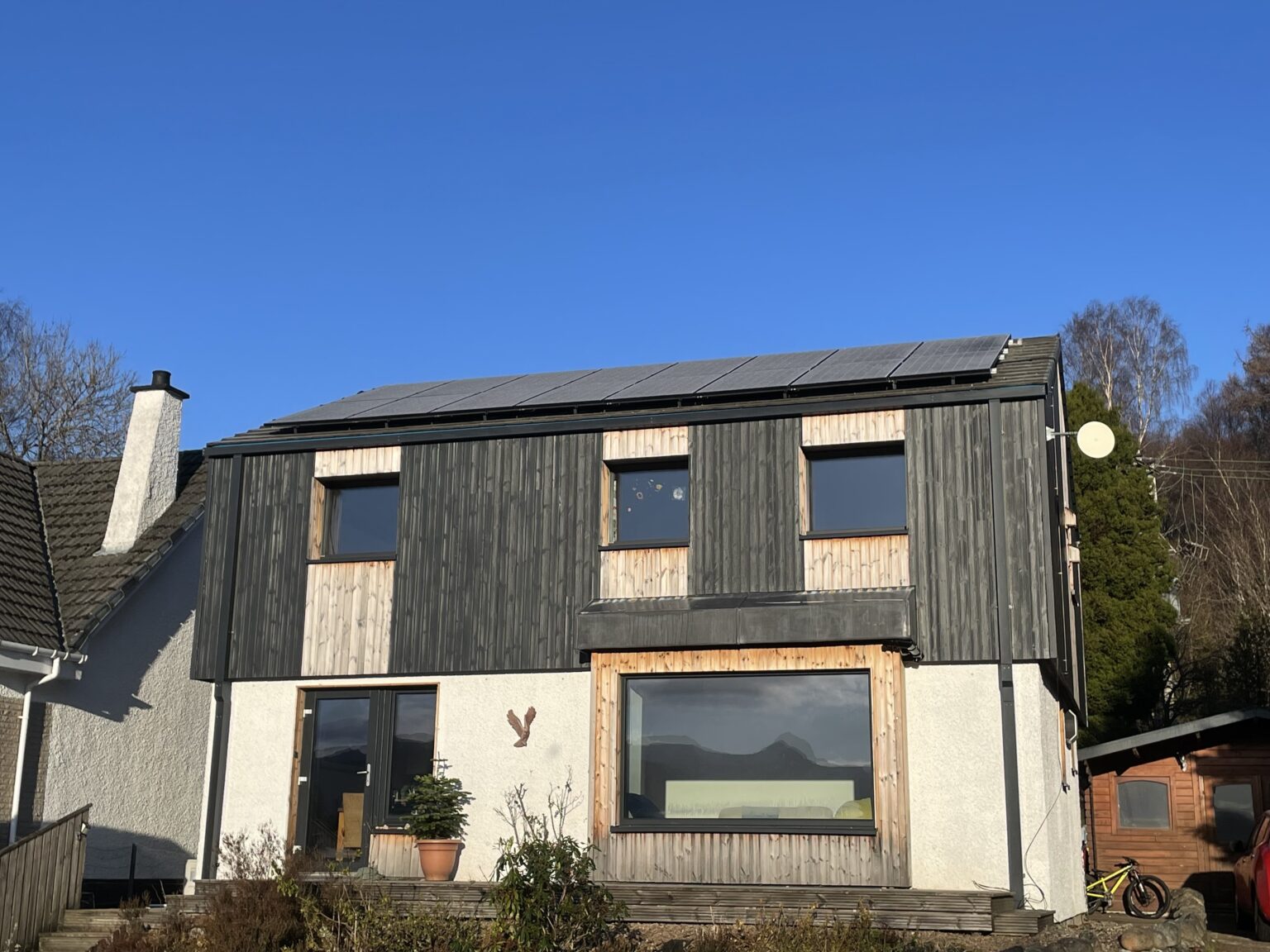 House with frost on the solar panels.